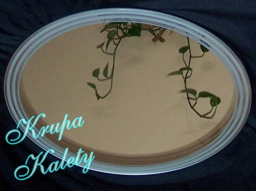 Piaskowane okągłe lustro.